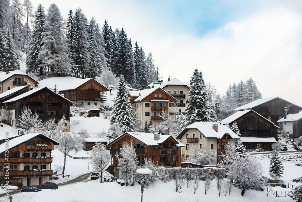 Wooden houses in winter in mountain village