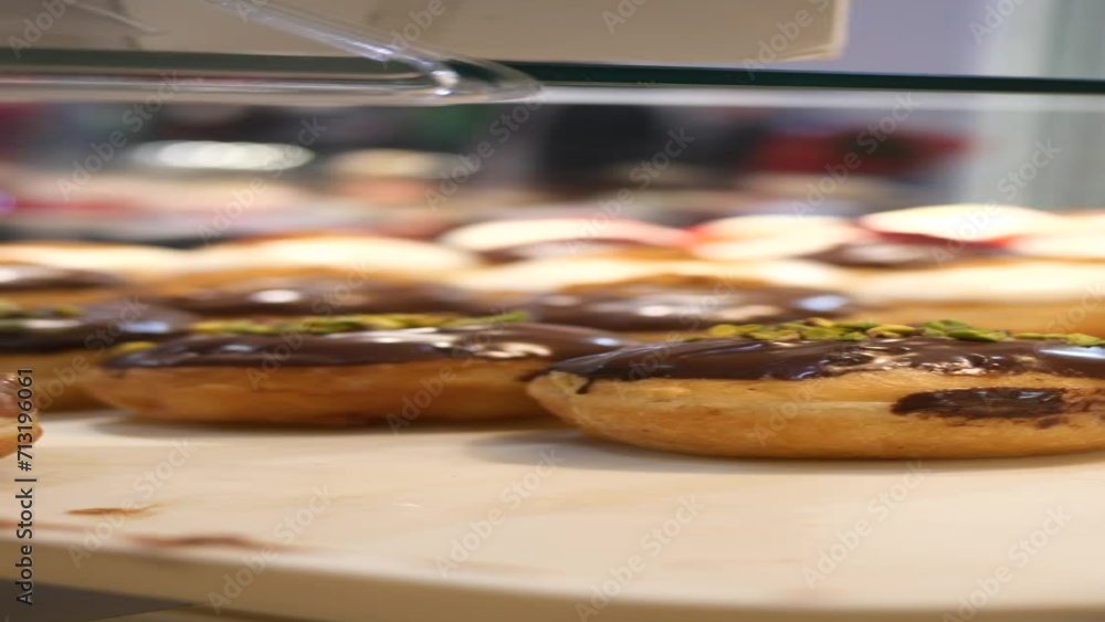 chocolate donuts display for sale at local store chocolate donuts display for sale at local store