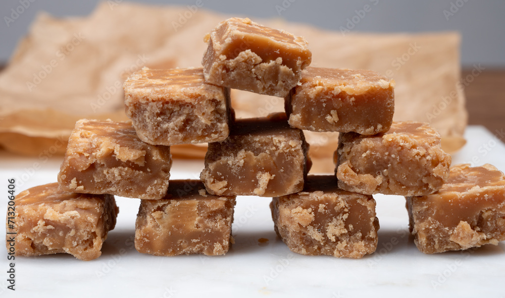 American sweets, homemade butter fudges, confection made by mixing sugar, butter and milk American sweets, homemade butter fudges, confection made by mixing sugar, butter and milk