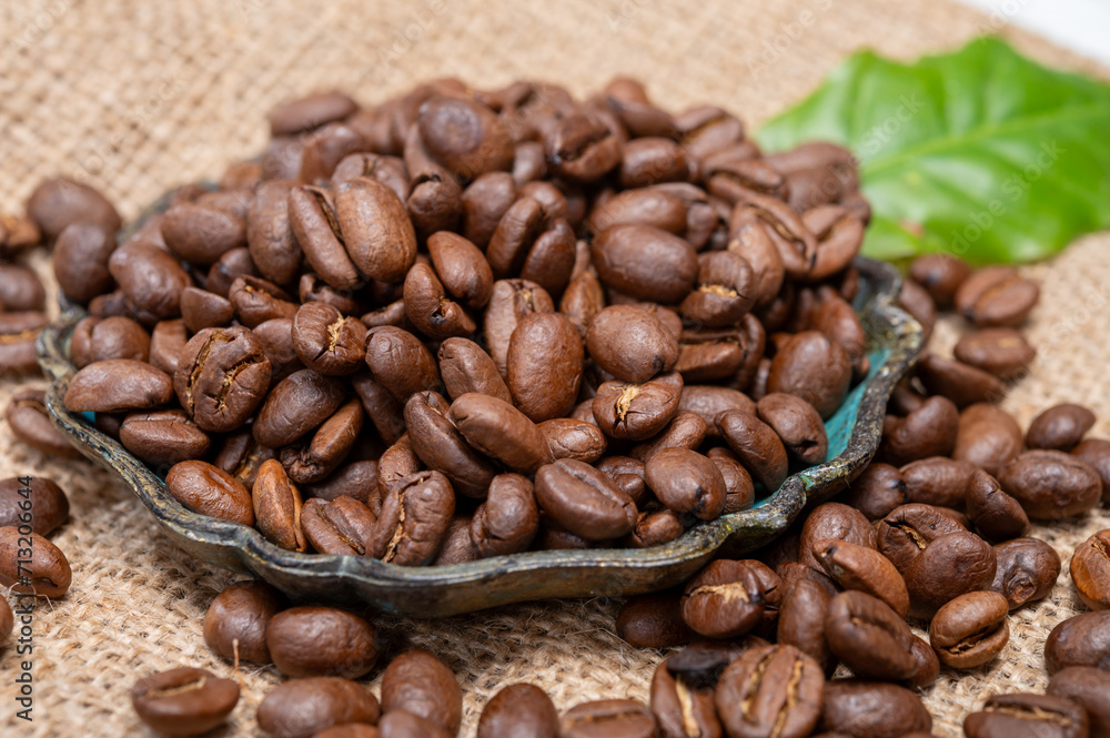 Arabica brown roasted coffee beans from Africa coffee producing region, cultivating in Ethiopia, Ivory Coast, Uganda, Kenya, Rwanda and Tanzania Arabica brown roasted coffee beans from Africa coffee producing region, cultivating in Ethiopia, Ivory Coast, Uganda, Kenya, Rwanda and Tanzania