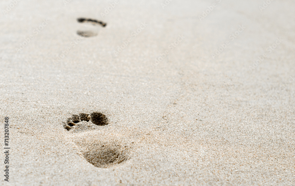 footprints in the sand on the beach closeup footprints in the sand on the beach closeup