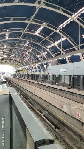 Jakarta, Indonesia – January 13, 2024: View of LRT Station Jakarta Harjamukti tunnel construction arch steel and railway from platform.