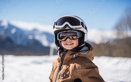 a boy skiing in the mountains with his gear on