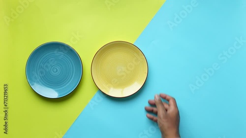 colorful round bowl or ceramic plate on table  photo