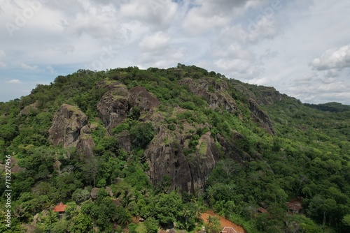 Nglanggeran Ancient Volcano in Gunungkidul Regency, Yogyakarta Indonesia. ancient volcano with large frozen lava rock formations. Indonesian landscape