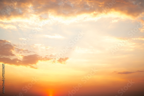 Beautiful   luxury soft gradient orange gold clouds and sunlight on the blue sky perfect for the background  take in everning Twilight  Large size  high definition landscape photo