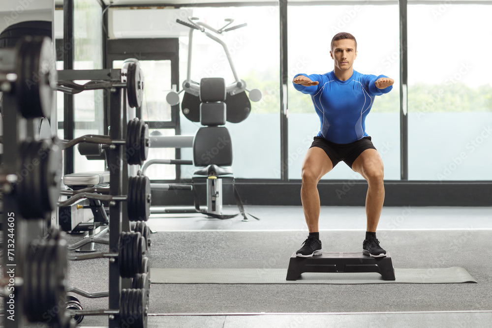 Step aerobic trainer exercising Step aerobic trainer exercising