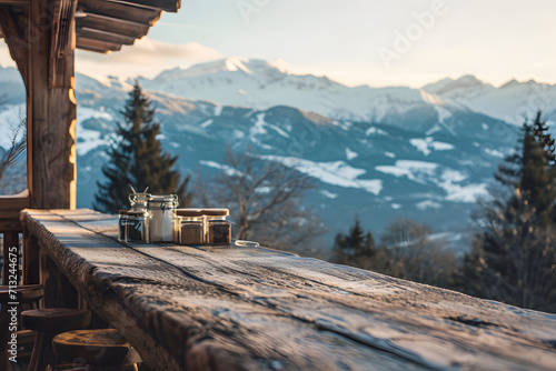 Mountain cabin wooden balcony with breakfast set and alpine view