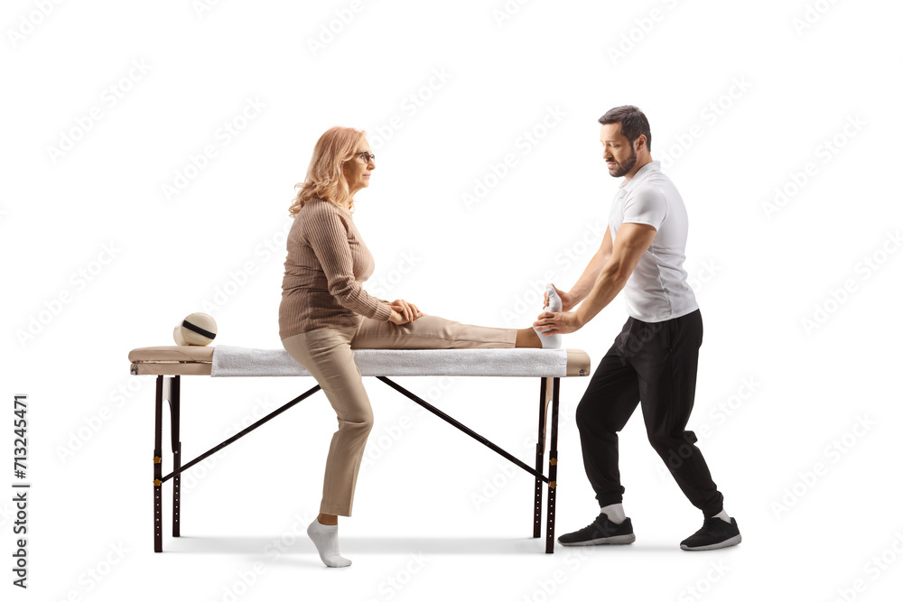Fototapeta premium Physical therapist treating a womans foot