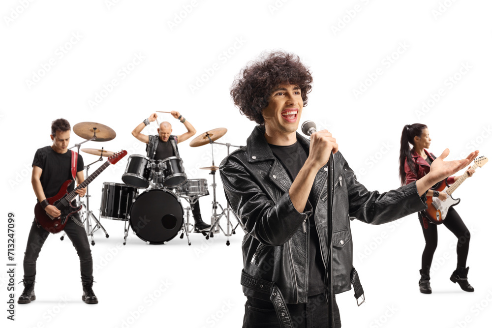 Fototapeta premium Rock male singer performing with guitarists and a drummer
