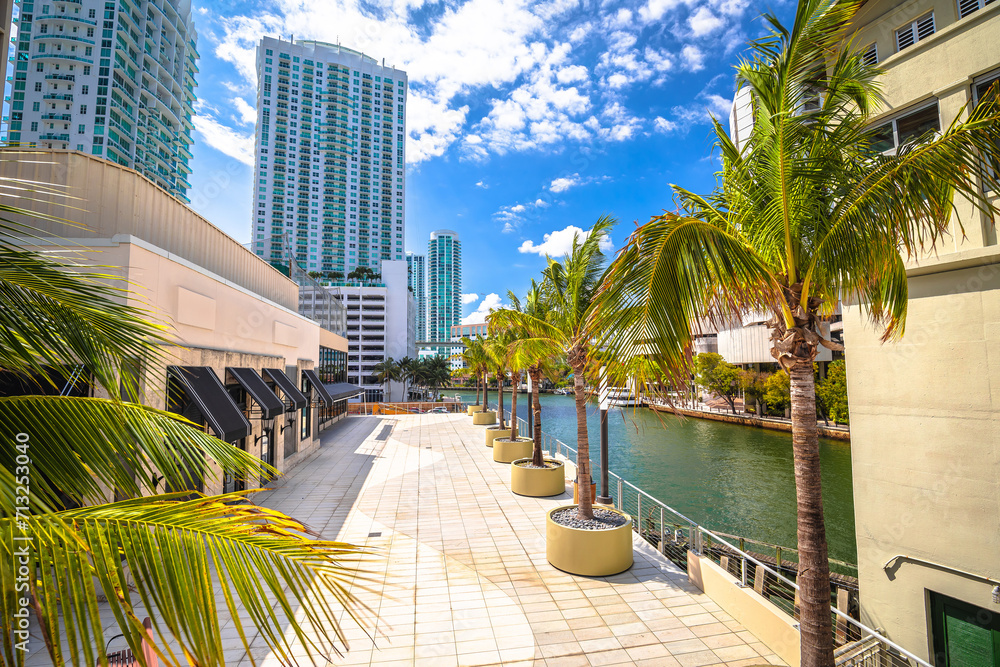 Miami river waterfront skyscrapers and walkway view, Florida