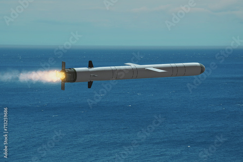 Kalibr ballistic missile flying over the sea, the trace of the missile launch, smoke and fire. Concept: war in Ukraine, missile attack from the sea. photo