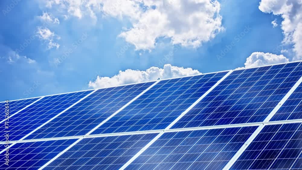 Time lapse of solar panels and sky cloudscape in summer
