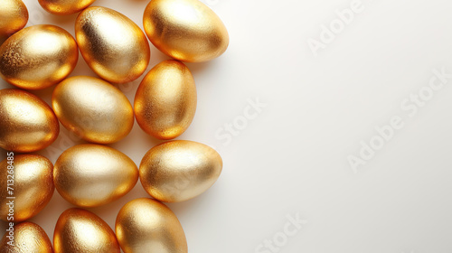 Golden easter eggs background, top view with copy space 