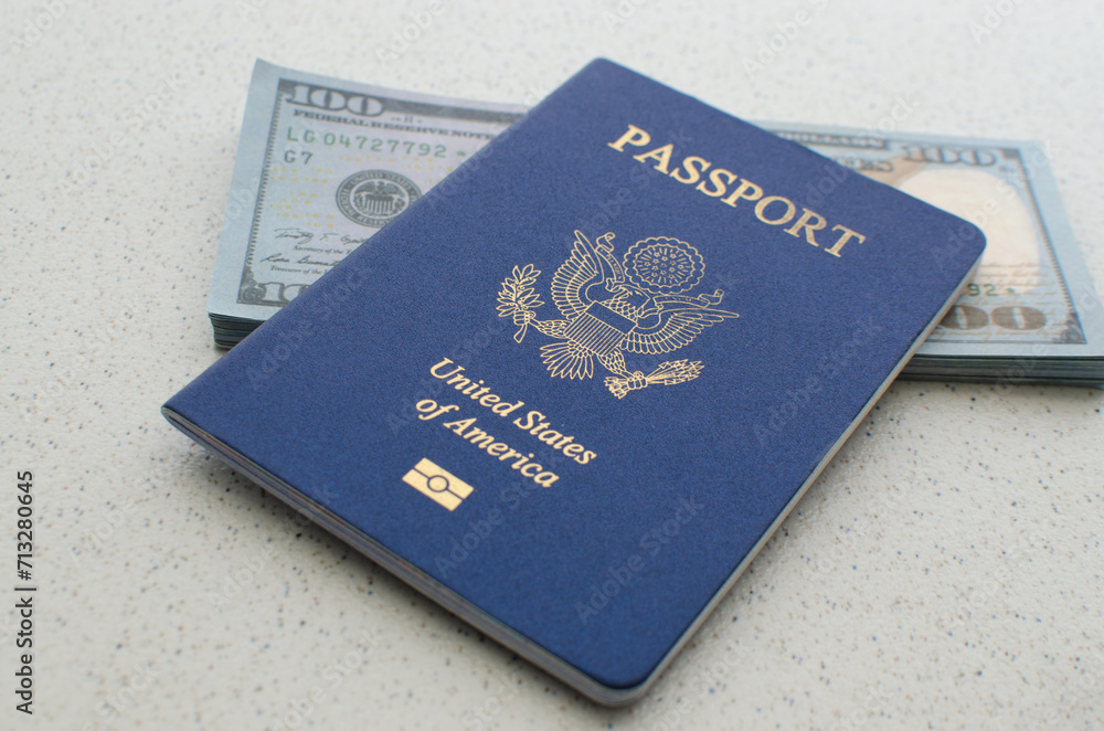 Close-up of a closed American passport, a symbol of travels to the United States of America. Close-up of a closed American passport, a symbol of travels to the United States of America.