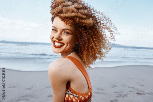 Beach Lifestyle: Smiling Woman with Backpack, Happy and Free – Portrait of a Nature-Loving Traveler