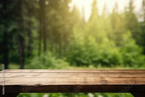 Beautiful blurred boreal forest background view with empty rustic wooden table for mockup product display. Picnic table with customizable space on table-top for editing. Flawless