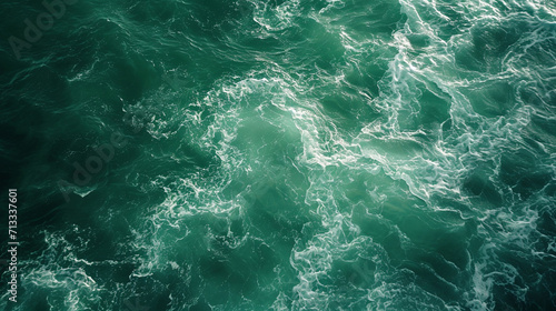 A background containing the green waves of an ocean © frimufilms