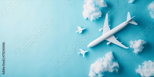 Airplane and cloud on blue background. Travel and vacation concept. copy space for text