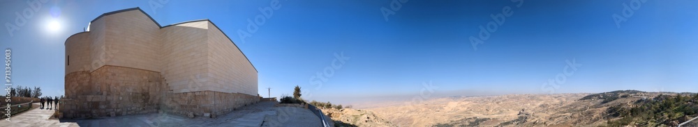 The Memorial church of Moses and the old portal of the monastery at Mount Nebo, Jordan,View from Mt. Nebo The Memorial church of Moses and the old portal of the monastery at Mount Nebo, Jordan,View from Mt. Nebo