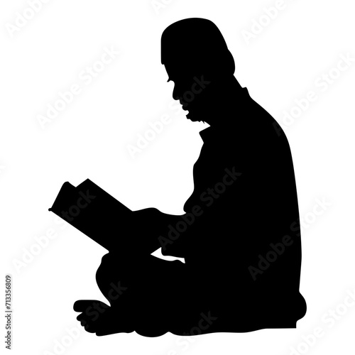 Silhouette of a Muslim man reading the Koran in black color only