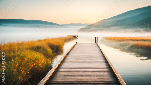 A straight flat simplistic rectangular lake dock. beautiful sunrise, foggy. calm water. Nature relax wallpaper © Alanh