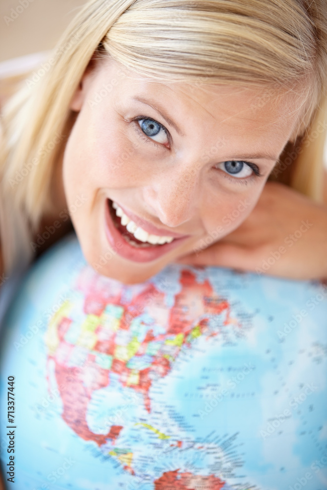 Excited woman, travel and globe with portrait and happy from earth day, holiday or international vacation. Smile, world and map for learning and geography with a female person and embrace of planet Excited woman, travel and globe with portrait and happy from earth day, holiday or international vacation. Smile, world and map for learning and geography with a female person and embrace of planet