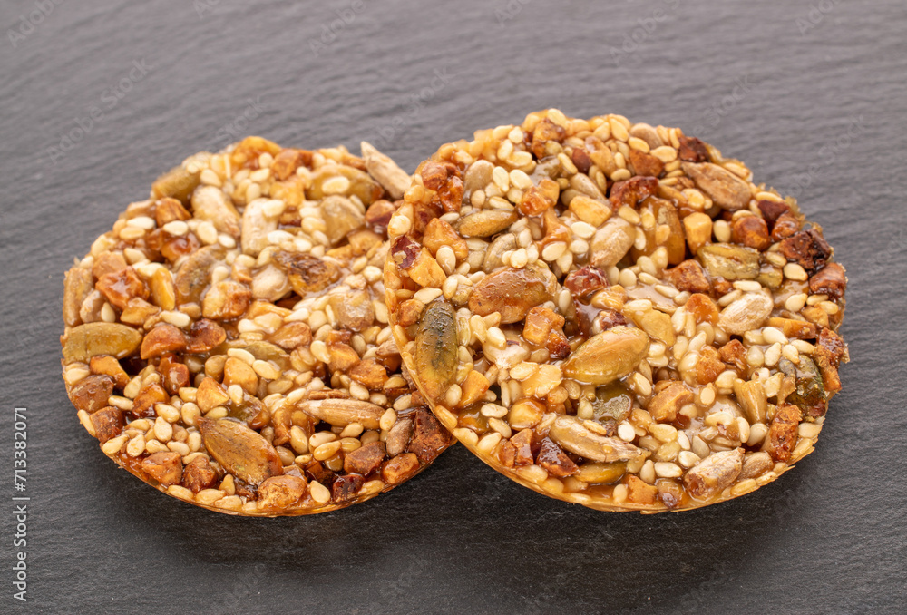 Two Thaler cookies on a slate stone, macro.