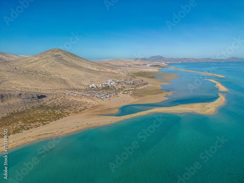 The drone aerial view of Sotavento beach, Costa Calma, Fuerteventura Island, Spain. Sotavento is regarded by many as the best beach on Fuerteventura.