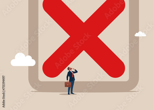 Businessman look high at big cross checkbox. Rejection business investment. Flat vector illustration