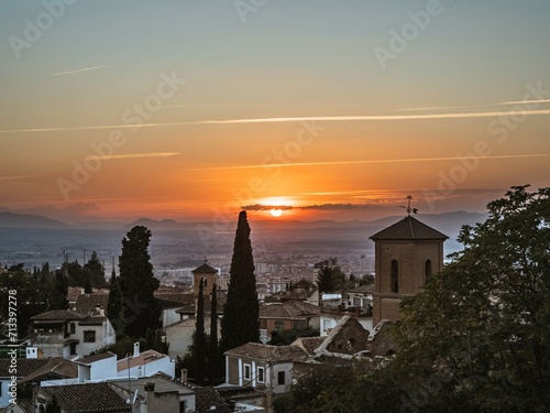 Sunset cityscape over Granada, Andalusia, Spain, in the old Albaicin district © MatyasSipos