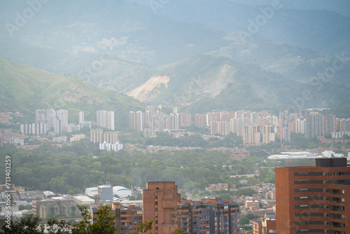 wide capture of urban landscape in south american major city with mountains in background