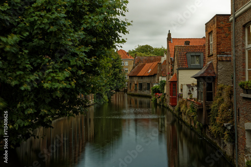 Bruges Belgium Medieval Town old city in Flanders Europe. Art and culture. Tourists from the world. Ancient medieval architecture gothic with towers buildings, canals, cobbled alleyways Brussels