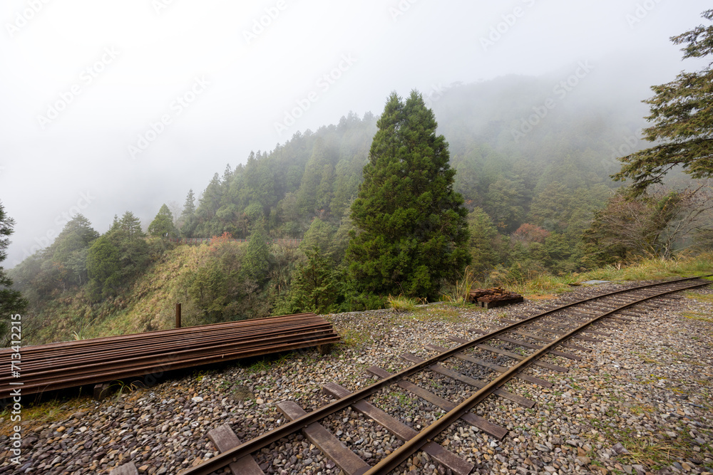 Train track in foggy mist on the mountain