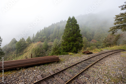 Train track in foggy mist on the mountain