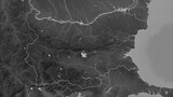 Bulgaria outlined. Grayscale elevation map