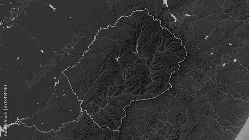 Lesotho outlined. Grayscale elevation map photo