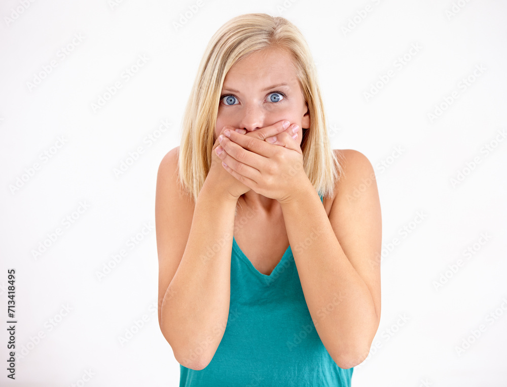 Gossip, portrait and woman cover mouth in surprise for announcement in studio on white background. Wow, shocked and girl with wtf, fake news or omg expression for crazy secret, mistake or drama Gossip, portrait and woman cover mouth in surprise for announcement in studio on white background. Wow, shocked and girl with wtf, fake news or omg expression for crazy secret, mistake or drama
