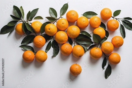 tangerines with leaves on white background with copy space