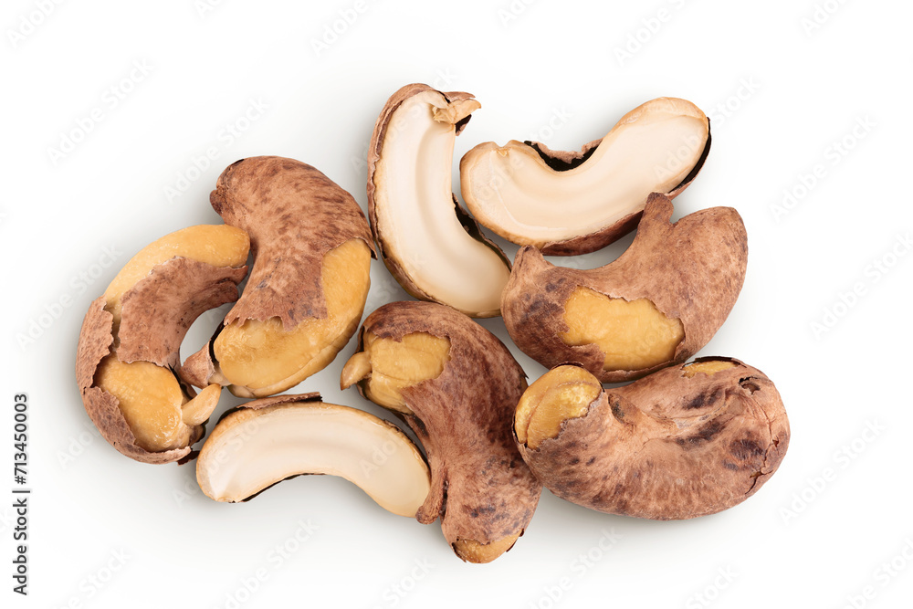 cashew nuts heap with shell isolated on white background. Top view. Flat lay cashew nuts heap with shell isolated on white background. Top view. Flat lay