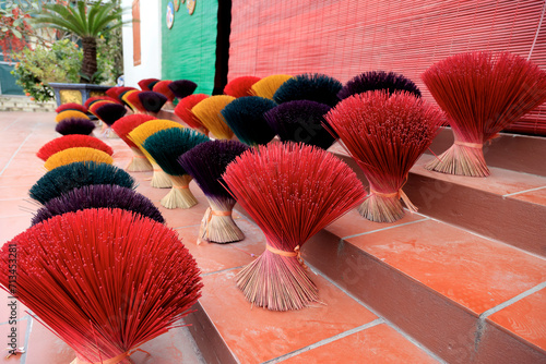 Colorful joss sticks left to dry in the sun  Vietnam