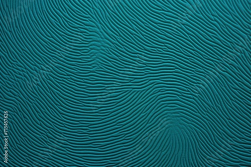  a close up of a blue background with wavy lines on the bottom of the image and bottom of the lines on the bottom of the image.