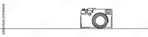 One continuous line drawing of a camera.