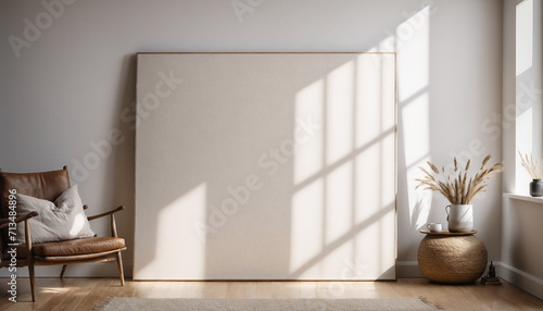Empty Canvas board hanging in an living room