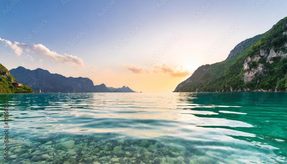 The sun behind the sea hill. Evening seascape.