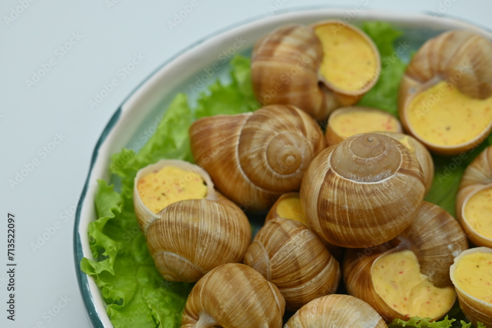 macro snails with white sauce photo above, snails with basil pesto, Grana Padano and pine nuts	
