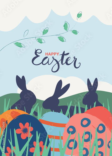 Easter poster or greeting card with easter eggs and rabbits in the meadow