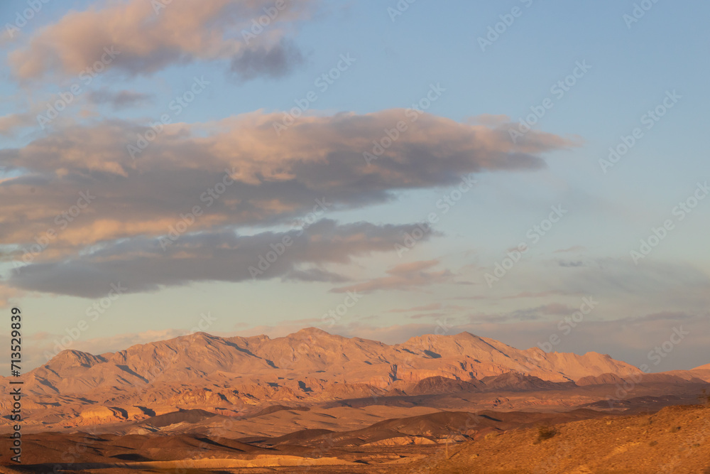 sunset over the mountains in the desert