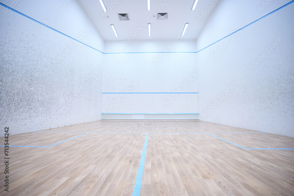Empty indoor squash or tennis court interior in white colors copy space - obrazy, fototapety, plakaty 