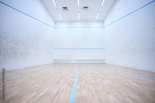Empty indoor squash or tennis court interior in white colors copy space photo